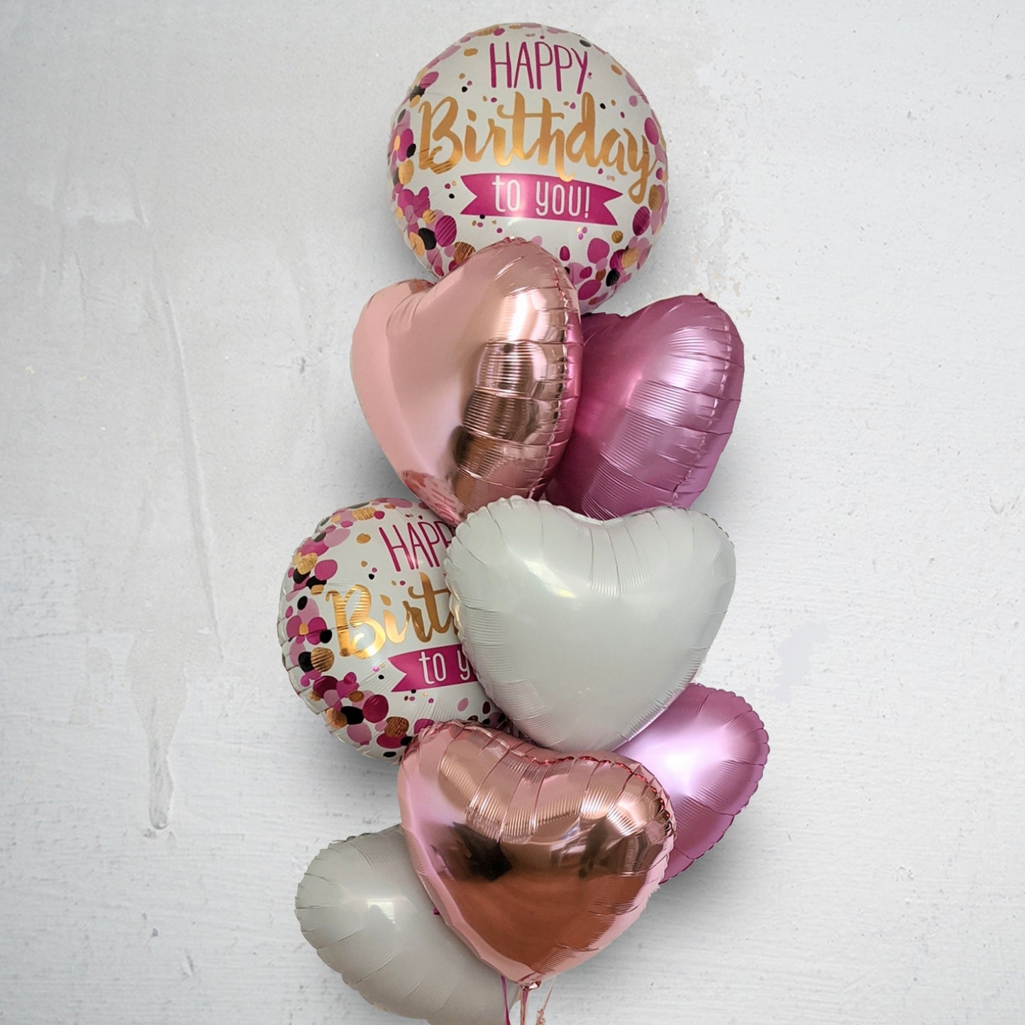 Pink, Gold and white birthday balloons