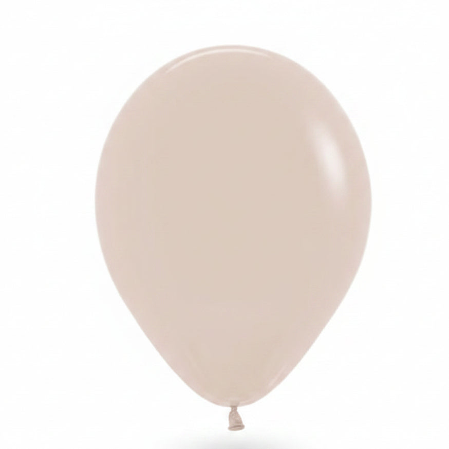 A single matte balloon in a light beige or cream color, shown against a plain white background.